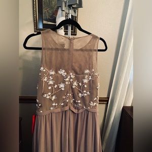 New, with tags. Cachet lavender champagne in color. Size 14